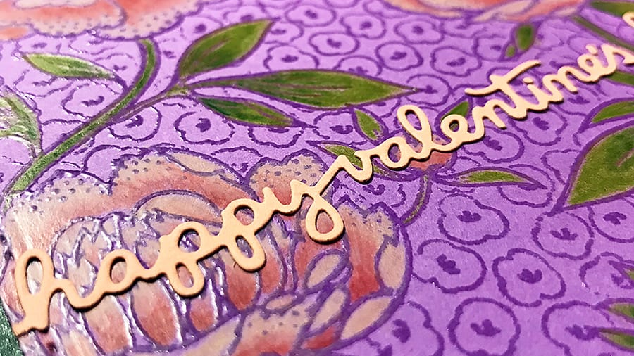 A Hand-Colored Floral Valentine, closeup of word die sentiment across the card front